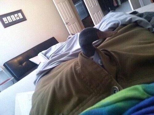 Duck sticking it's head out of some pants